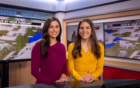 UAlbany's WNYT students take photo in studio.