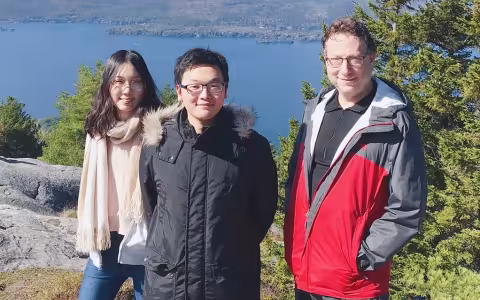 Jeffrey Braunstein on a hike up Buck Mountain with two of his undergraduate assistants. 