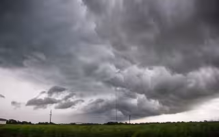 Photo of dark clouds with potential to form a tornado.