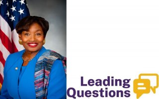 Photo of a smiling Andrea Stewart-Cousins in a bright blue suit in front of a U.S. flag, next to a logo reading Leading Questions