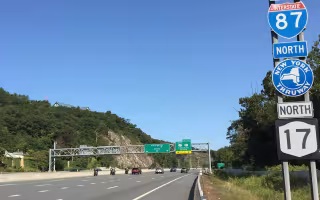 A highway in New York State during the daytime
