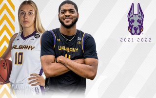 Women's and Men's basketball player stand back to back