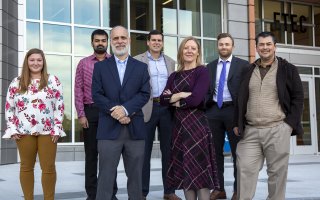 researchers from CEHC and CTG UAlbany stand outside the new ETEC building on the Harriman Campus in Albany NY
