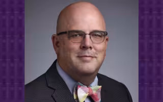 Shawn Bushway in glasses and a bowtie