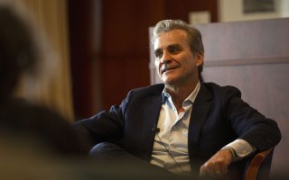 Tom Junod, in a blue blazer and white shirt