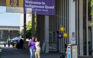 Residential Life staff greet new students at Indigenous Quad.