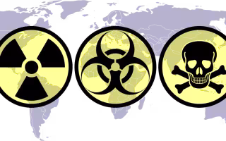 World map with WMD hazard symbols superimposed on it.