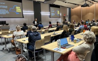 Attendees watch a presentation during the Pediatric Emergency Preparedness seminar inside ETEC's first floor meeting room.