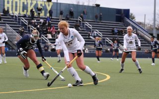 UAlbany field hockey start Alison Smisdom moves the ball against Penn State in the NCAA Quarterfinals at the University of Michigan.