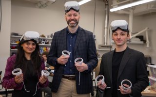 Vasuda Trehan (left), Michael Leczinsky and James Gillanders wear Meta Quest 2 headsets inside the CEHC Makerspace.