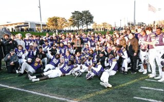 The UAlbany football team celebrates its first CAA football title on Saturday, Nov. 18.