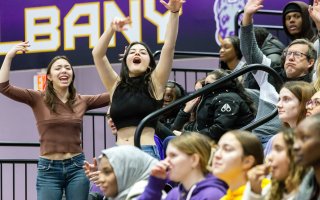 UAlbany fans cheer during the 2024 Big Purple Growl in the stands at Broadview Center.