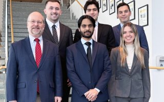 From left, Professor and Chair of Finance David Smith, Kevin Holder, Ashar Zahid, Tyler Rico, team leader Nohl Schwandtner and Sophia Hofer.