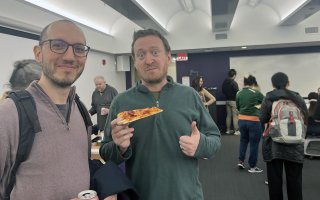 Faculty and staff from UAlbany's Department of Mathematics and Statstics celebrates Pi Day on March 14 with pizza.