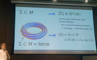 University of North Carolina Professor of Mathematics Richárd Rimányi presents his findings at the AMS Fall Meeting at the University at Albany on Oct. 19. (Photo by Cristian Lenart/UAlbany Mathematics)