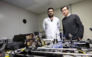 University at Albany Department of Nanoscale Science & Engineering Professor Mengbing Huang and doctoral student Sahyadri Anil Patil demonstrate a reliable ion implantation cladding method for sapphire optics fiber.
