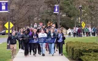 Students walking in last year's Out of the Darkness Walk at UAlbany