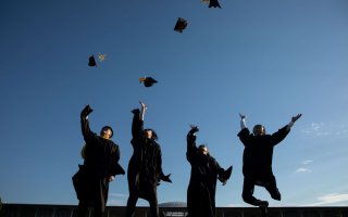 UAlbany students celebrating their graduation