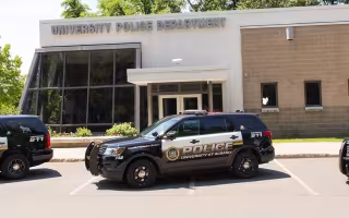 photo of University Police Department station with vehicles