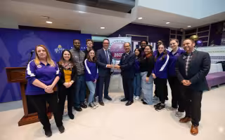 Student Affairs and Enrollment staff gather at celebration for the 2025 award