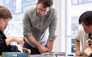 Jason Corace interacts with students in his Game 100 course.