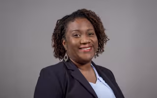 Headshot of DeeDee Bennett Gayle, associate professor at the College of Emergency Preparedness, Homeland Security and Cybersecurity.