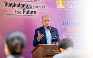 UAlbany chemist Igor Lednev offers remarks at the International Congress on Biophotonics.