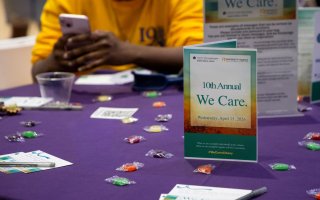 Photo of sign celebrating 10th annual We Care event on April 15