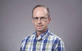 Headshot of Paul Roundy, professor in the Department of Atmospheric and Environmental Sciences.