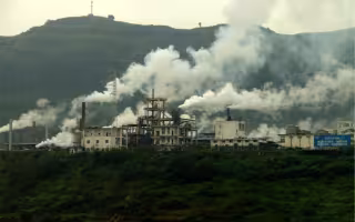 Smoke rises from a factory in China at the Yangtze River.
