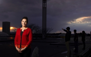 Kristen Corbosiero stands on the roof overlooking the academic podium.