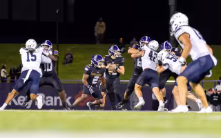 UAlbany QB Kai Colón lines up for a pass at Bob Ford Field.