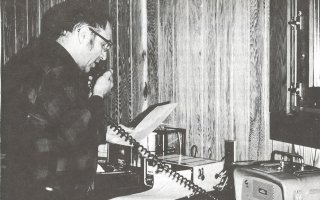 Ray Falconer gives his radio weather forecast from inside the Whiteface Mountain Field Station.