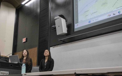 Pamela Hoxha (left) and Jaelyn Staiano (right) present about the Complex Case Mapping and Analysis Project