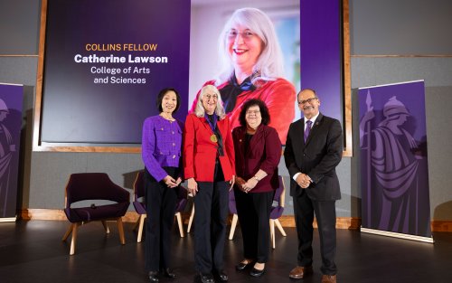 Provost Carol Kim, Professor Catherine Lawson, College of Arts and Sciences Dean Jeanette Altarriba and President Havidán Rodríguez pose for a photo in front of a projector screen, which shows a photo of Professor and the words, “Collins Fellow, Catherine Lawson, College of Arts and Sciences."