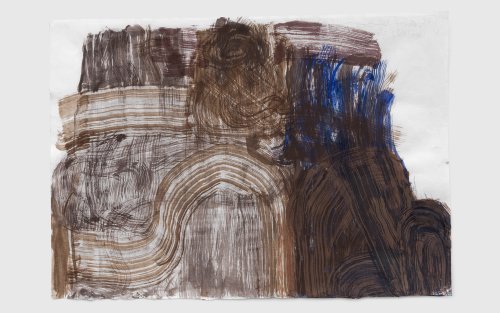 Drawing on paper with brown and blue marks