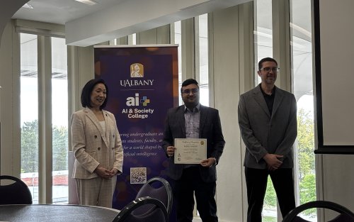 Karan Bashin receiving AI & Society Dissertation Fellowship