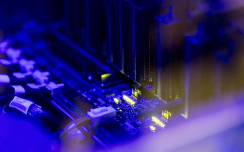 A closeup of the wiring for the IBM Research AIU Spyre prototype accelerators at UAlbany.