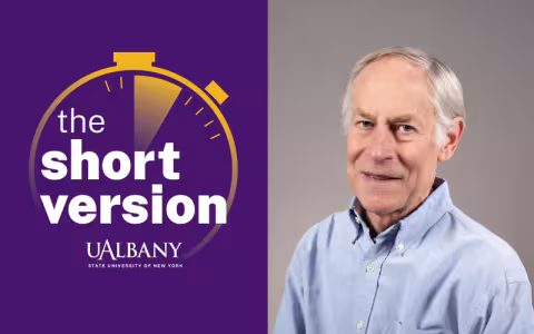 A split image with the left side including the text "The Short Version" in white over a purple background and the ride side including the smiling portrait of man with white hair and light blue collared shirt.