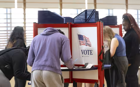 Students take part in voting during election season 2024 at UAlbany indoors.