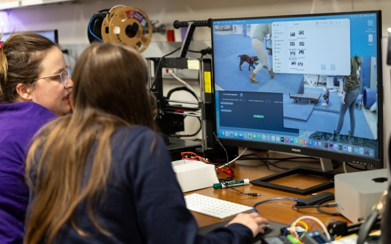 Students work with research staff inside UAlbany's Mobile Sensor Lab to identify and track canine movements on a treadmill.