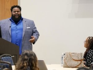 A speaker gives a talk at the Intersectional Antihomophobia & Antiracism Workshop in April of 2023.