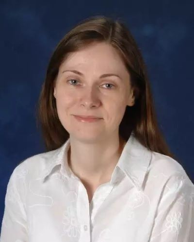 A portrait of UAlbany alum and instructor April Schmidt