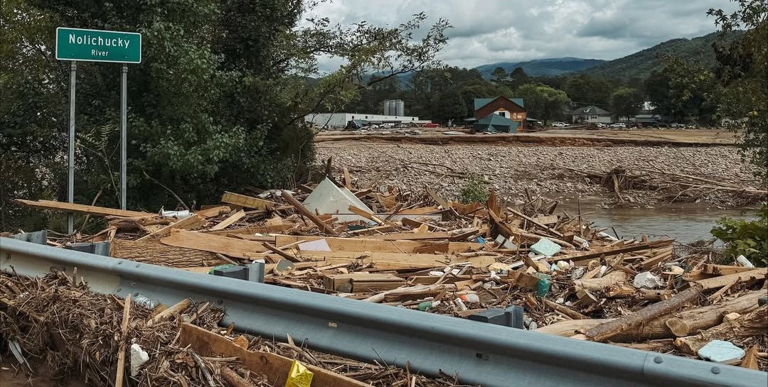 The Nolichucky River packed with wood, household items and other storm debris from Hurricane Helene.