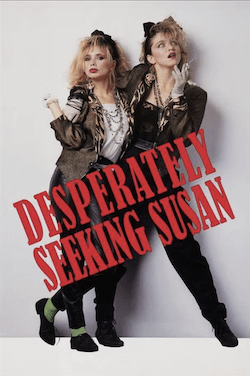 Film poster for "Desperately Seeking Susan" featuring two blonde women leaning on each other smoking cigarettes