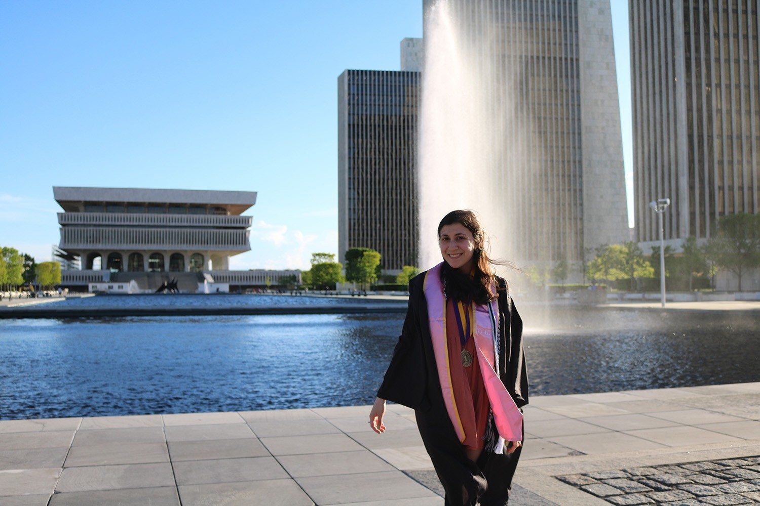 Iszzy Hernandez '22, stands on the Empire State Plaza in Albany, NY.