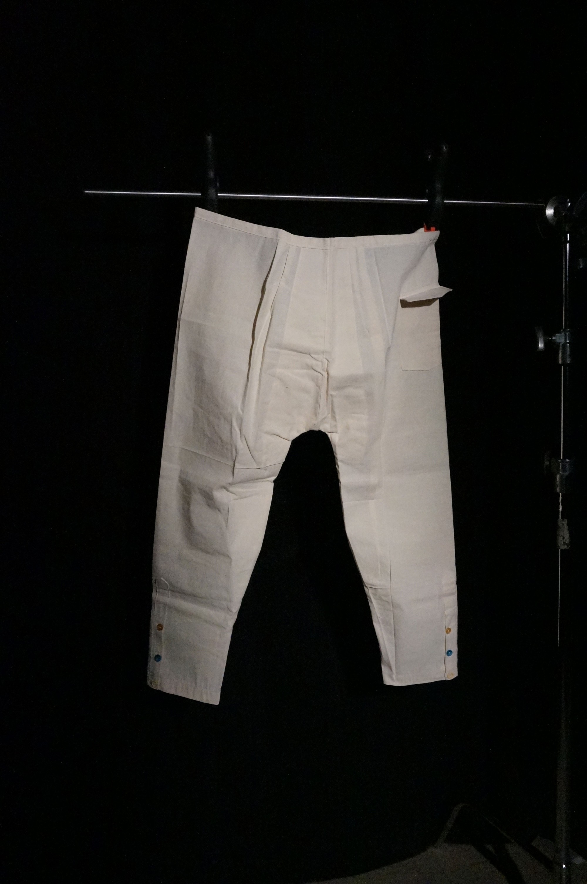 A man's white linen pants.