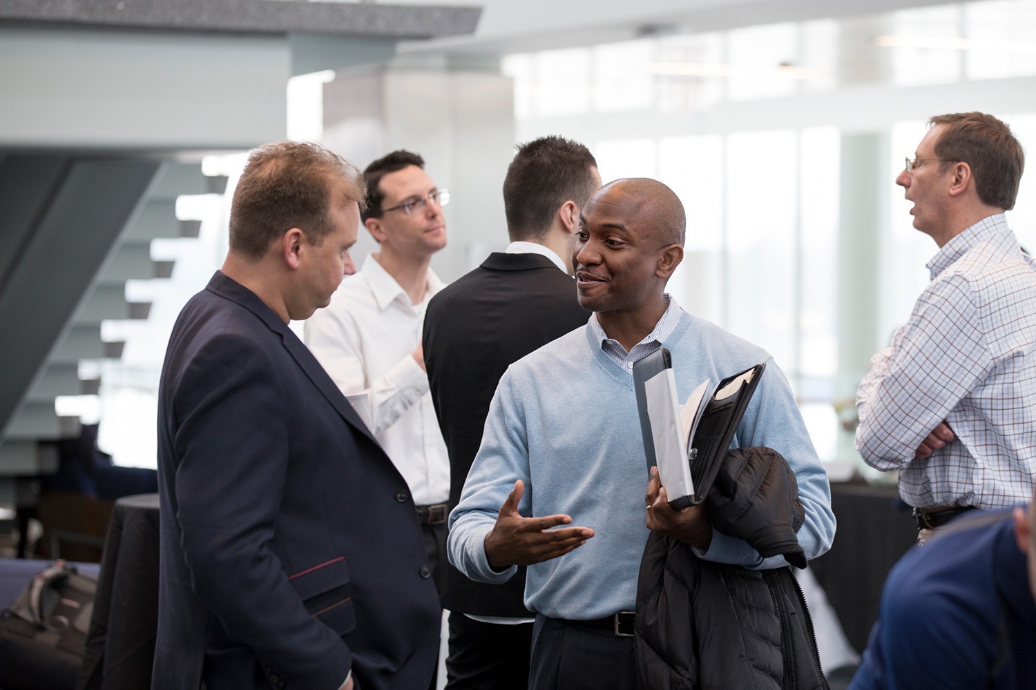 Employers networking at Cyber Job Fair