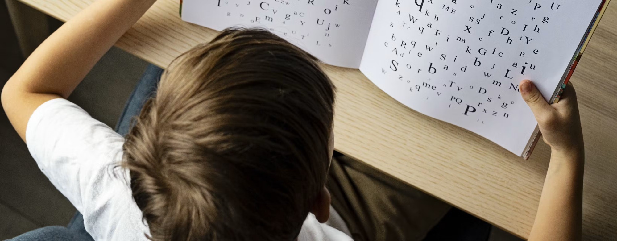 A child reading a book.