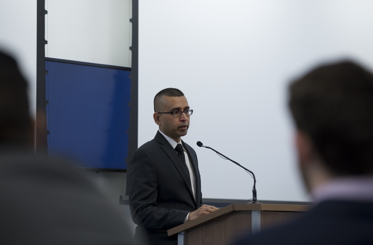 Sanjay Goel presenting at cybersecurity event 
